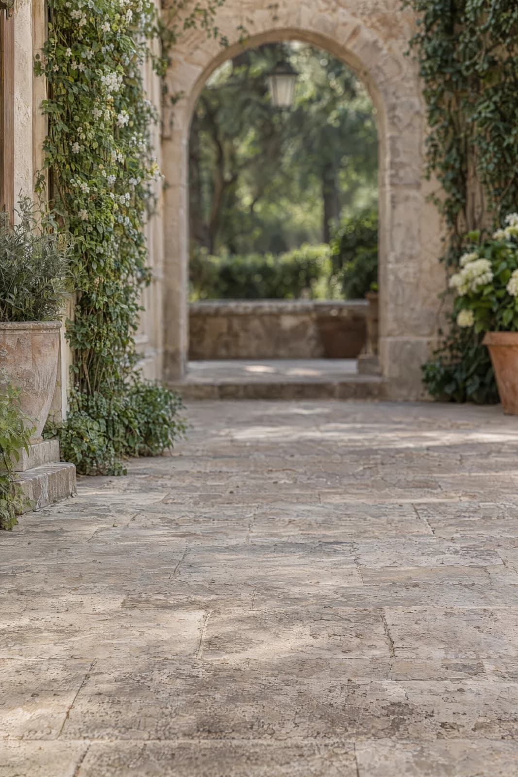 Stone courtyard arch — empty photographic background