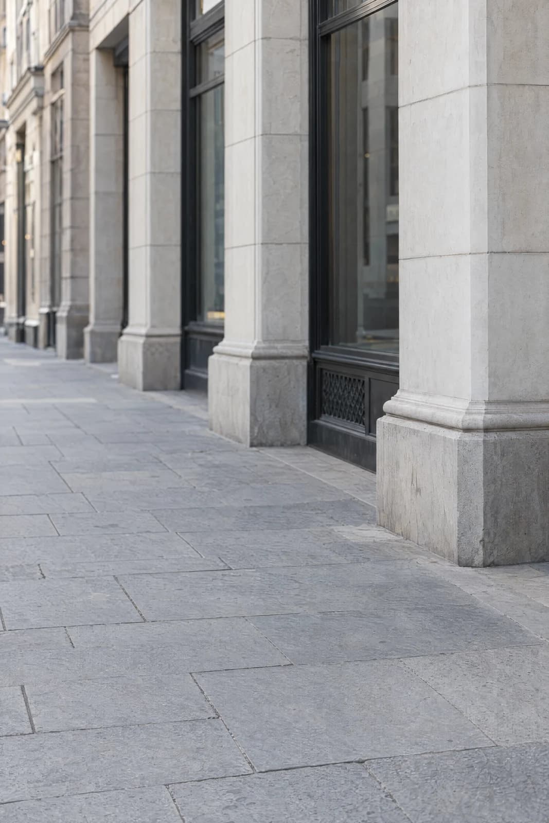 Quiet city sidewalk — empty photographic background